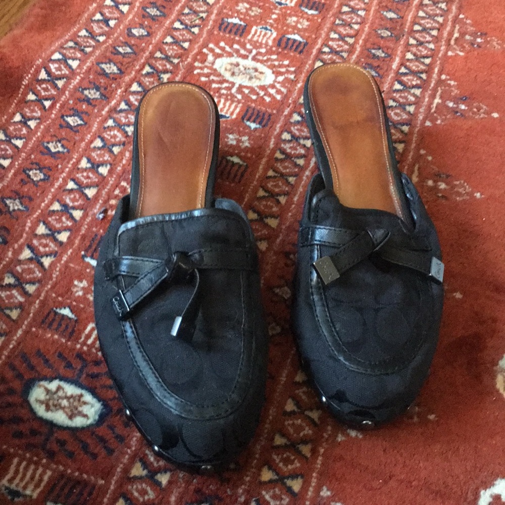 Black Coach clogs with leather bow